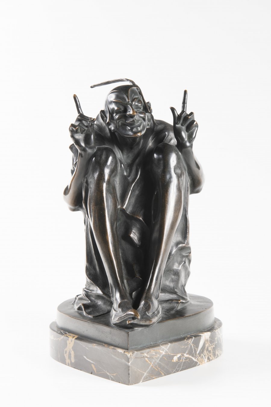 SITTING MEPHISTOPHELES