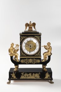 AN EMPIRE CLOCK WITH MUSIC BOX