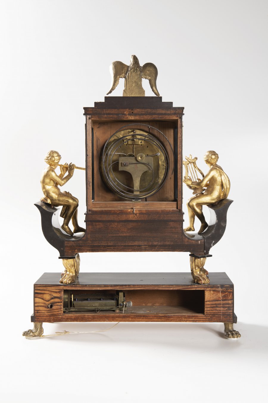 AN EMPIRE CLOCK WITH MUSIC BOX