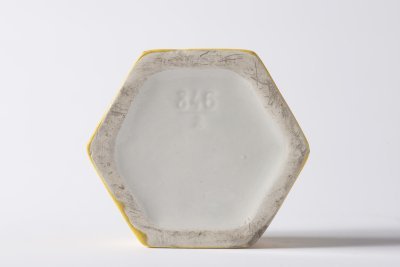 A YELLOW CUBIST BOX WITH A LID
