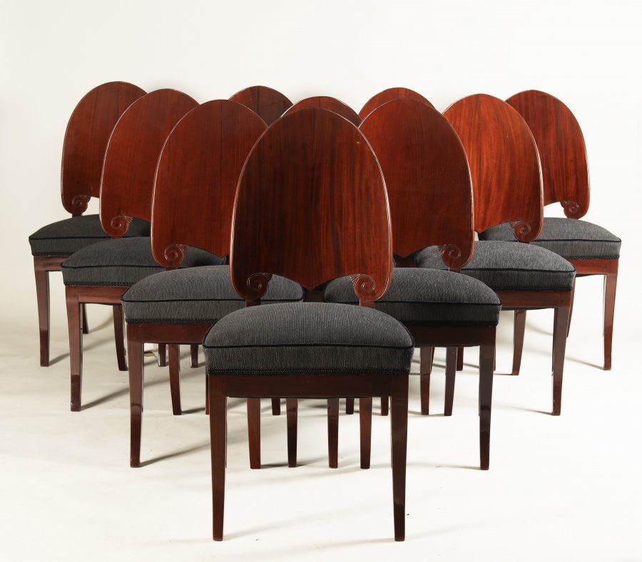 A SET OF TWELVE NORTHERN EUROPEAN MAHOGANY CHAIRS 