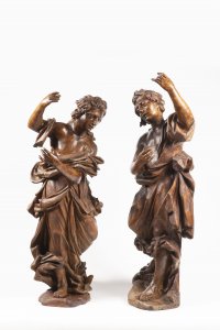 A PAIR OF WOODEN STATUES