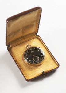 AN OMEGA POCKET WATCH