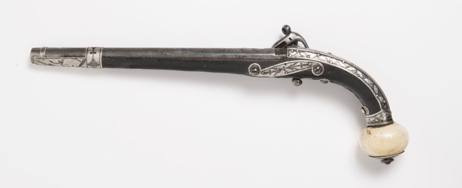 A CAUCASSIAN PERCUSSION PISTOL