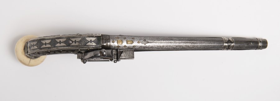 A CAUCASSIAN PERCUSSION PISTOL