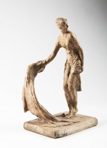 WOMAN LIFTING HER ROBE AFTER A BATH