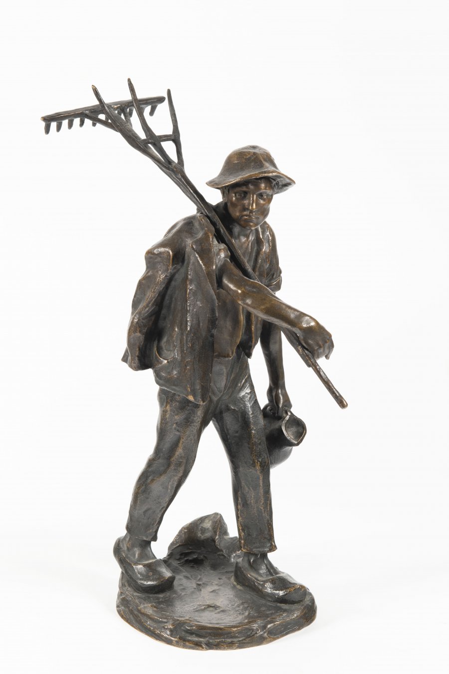 FARMER WITH A RAKE