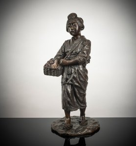 GIRL WITH A BASKET OF KAKI