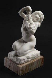 A GIRL WITH GRAPES
