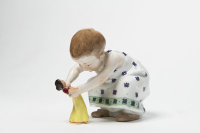 A CHILD WITH A DOLL