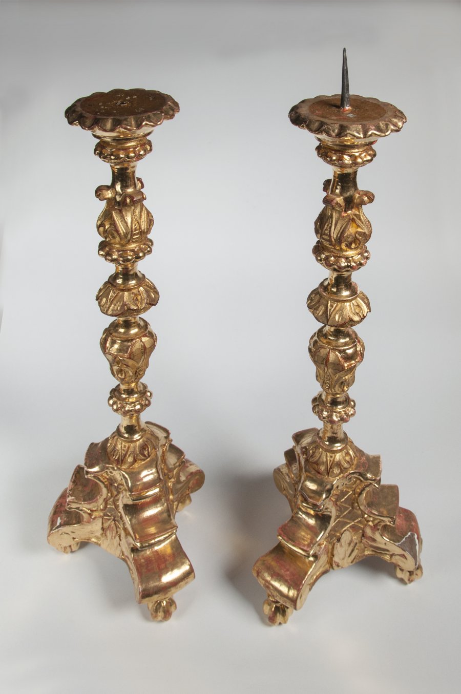 PAIRED GILDED CANDLESTICKS