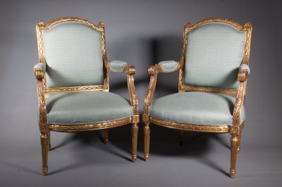 PAIRED GILDED ARMCHAIRS