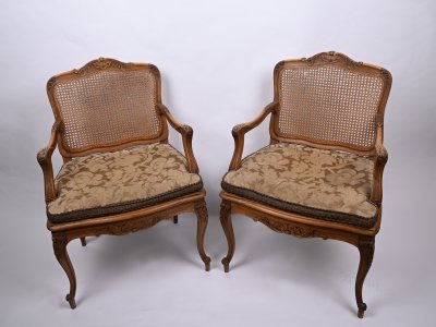 PAIRED ARMCHAIRS WITH A WEAVE