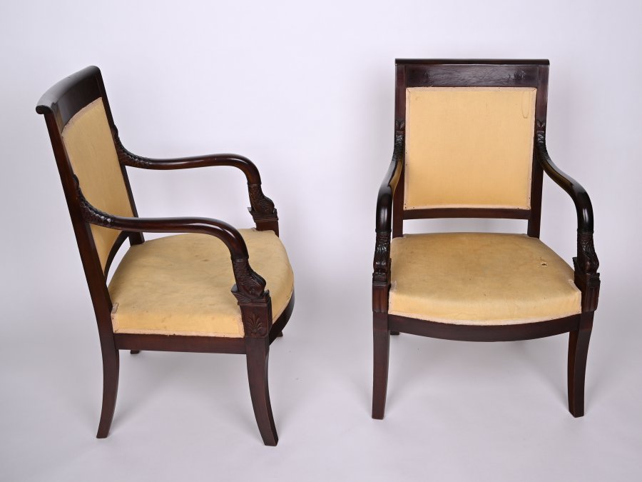 TWO CHAIRS WITH CARVED FISH DECORATIONS