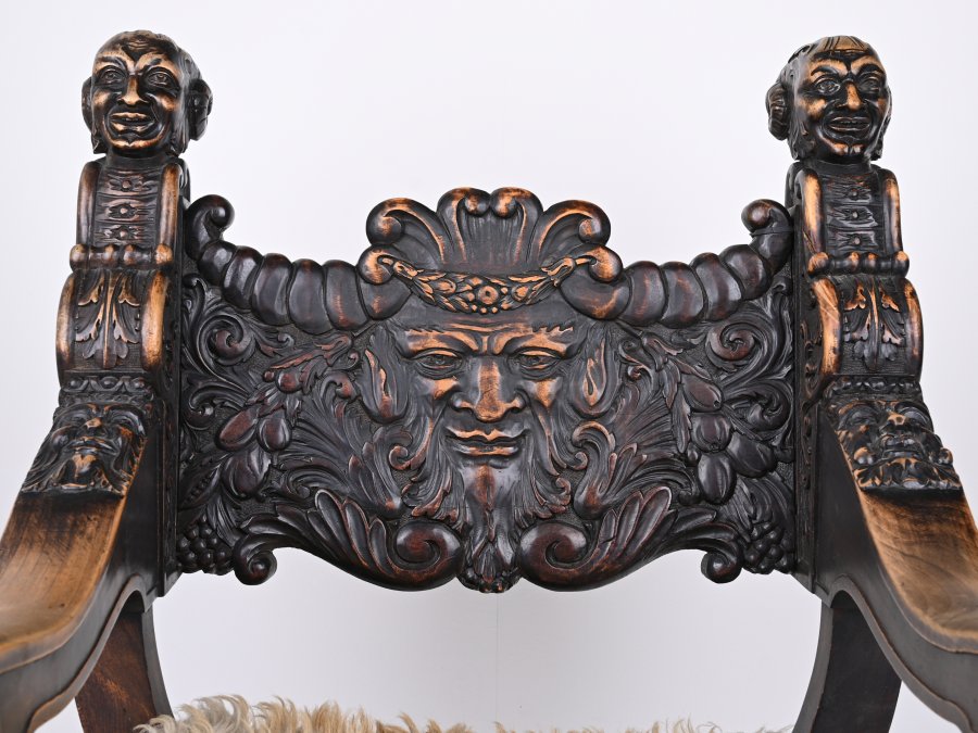 RICHLY CARVED RENAISSANCE STYLE ARMCHAIR