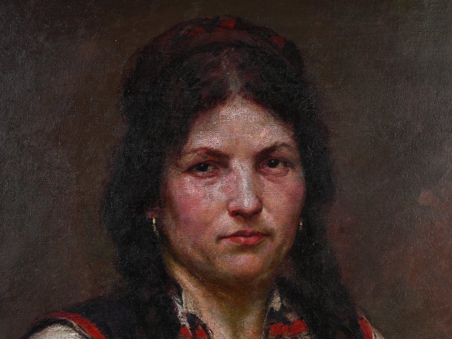 WOMAN IN A FOLK DRESS