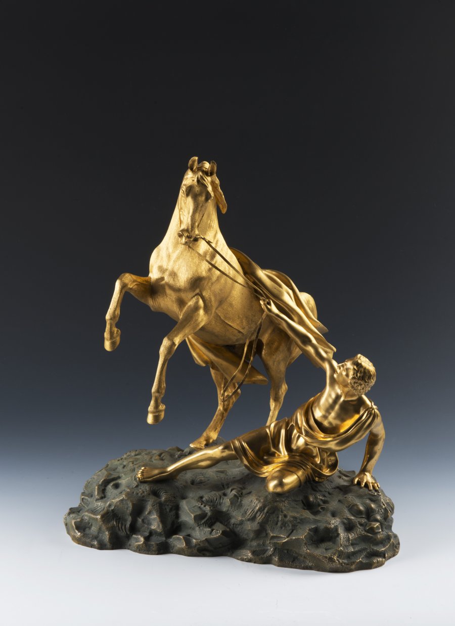 A PAIR OF BRONZE HORSE STATUES