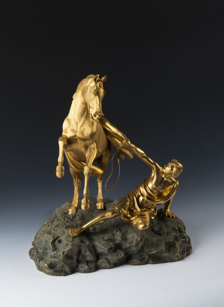 A PAIR OF BRONZE HORSE STATUES