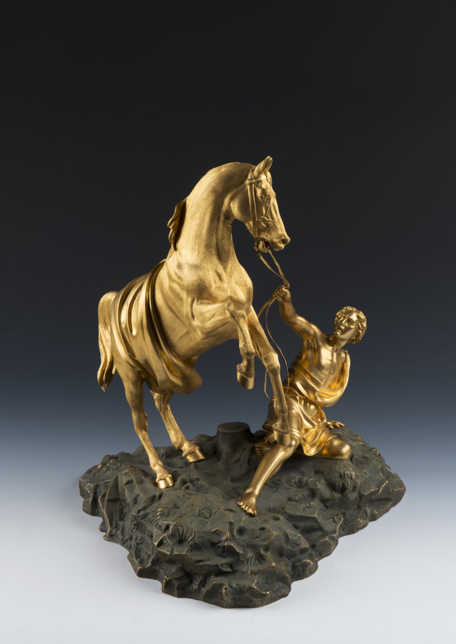 A PAIR OF BRONZE HORSE STATUES