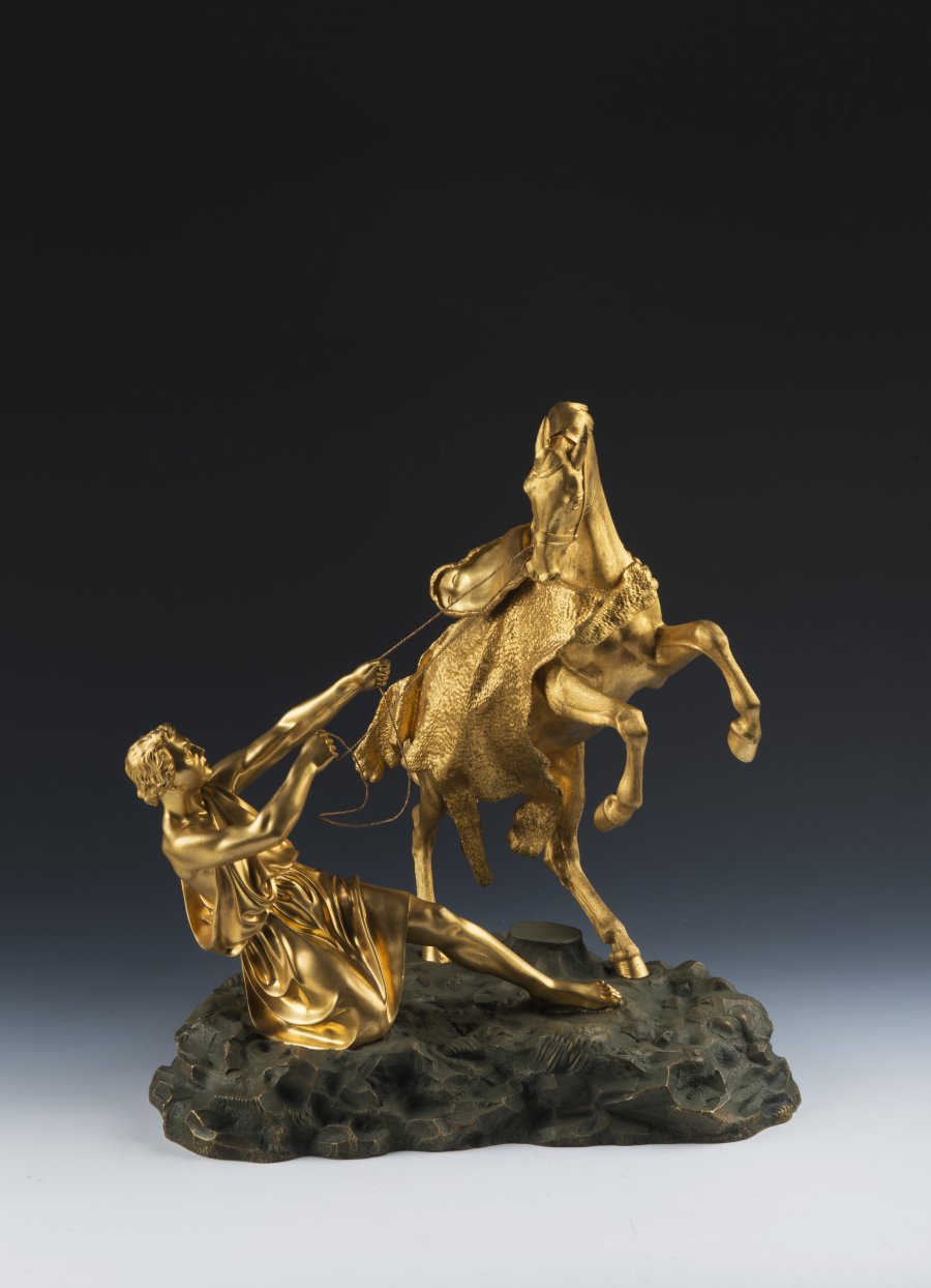 A PAIR OF BRONZE HORSE STATUES