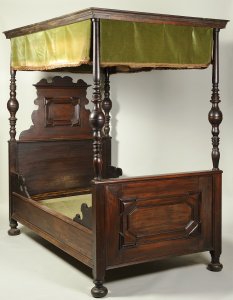 A NEO-RENAISSANCE FOUR POSTER WALNUT BED