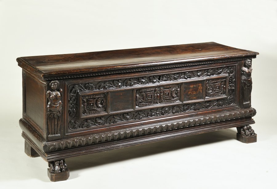 A CARVED WALNUT CHEST