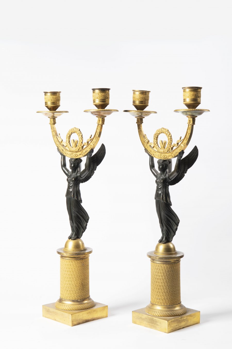 A PAIR OF EMPIRE CANDELABRA