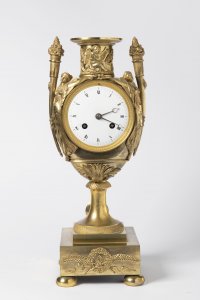 AN EMPIRE TABLE CLOCK