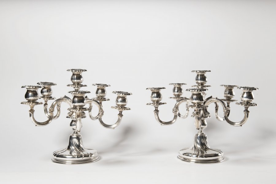 A PAIR OF SILVER CANDELABRAS