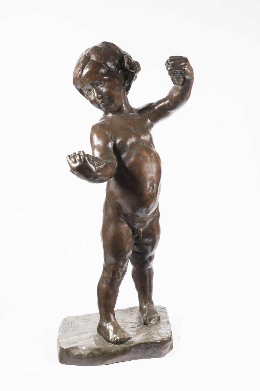 A BOY WITH GRAPES