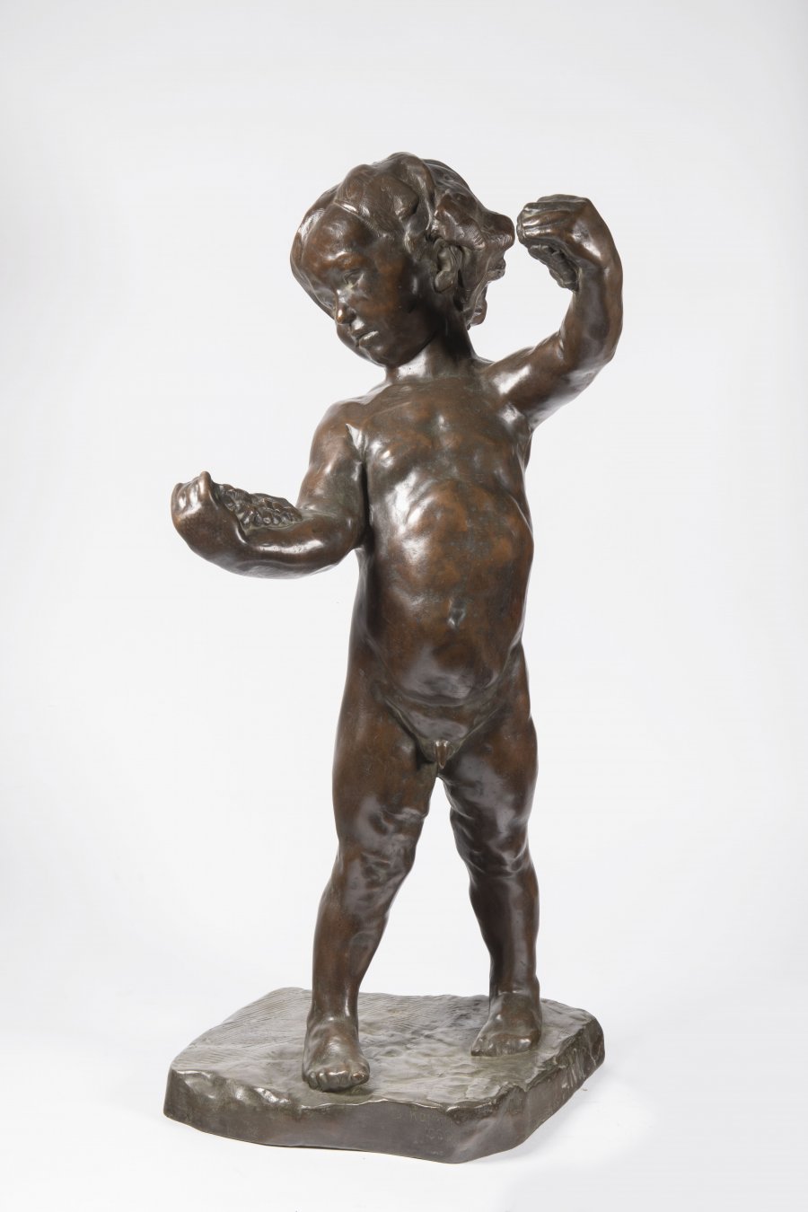 A BOY WITH GRAPES