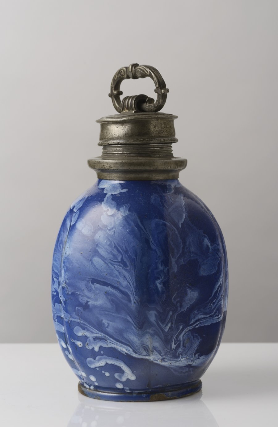 A Habán Bottle with a Pewter Screw Top