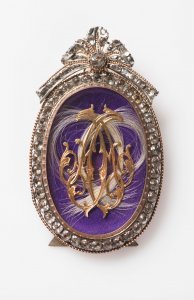 A MINIATURE WITH A MONOGRAM