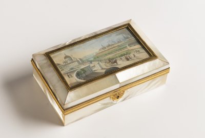 A BOX WITH A MINIATURE