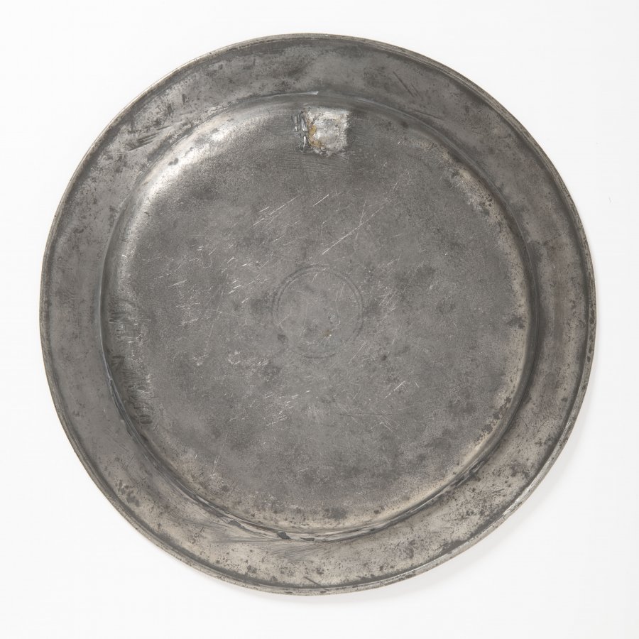 A PEWTER PASSOVER PLATE