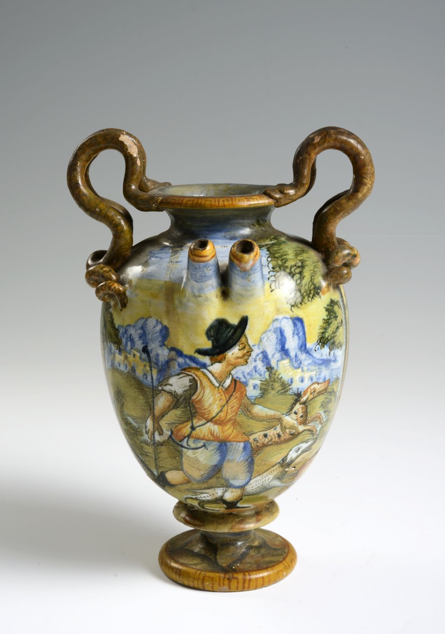 A MAJOLICA APOTHECARY JAR WITH A HUNTING SCENE
