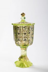 A GLASS GOBLET WITH LID
