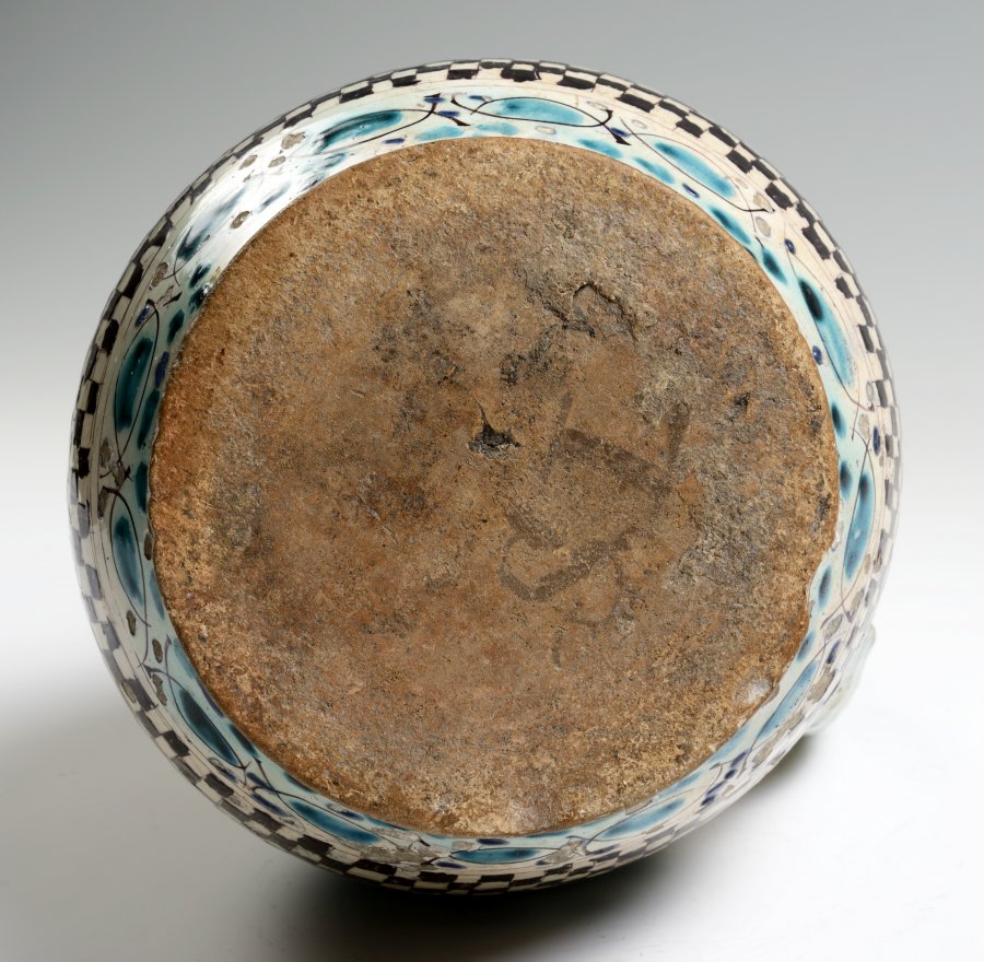 A NARROW MOUTH JUG (“OWL” STYLE)