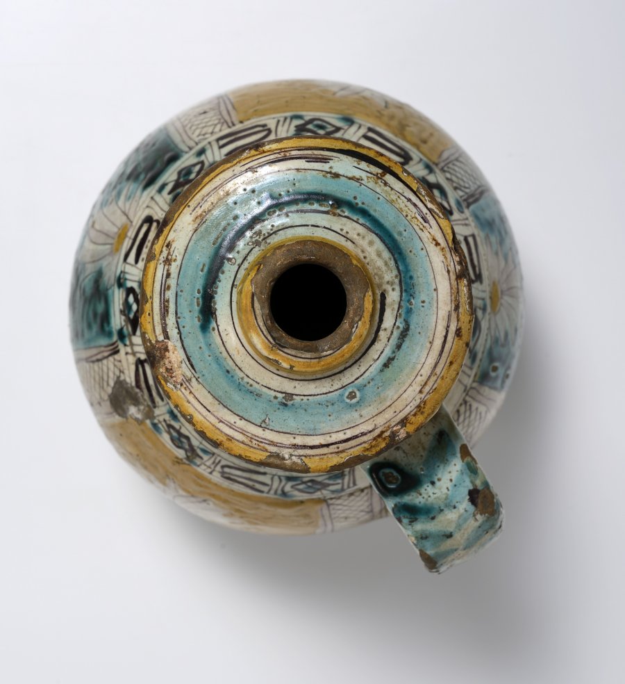 A NARROW MOUTH JUG (“OWL” STYLE)