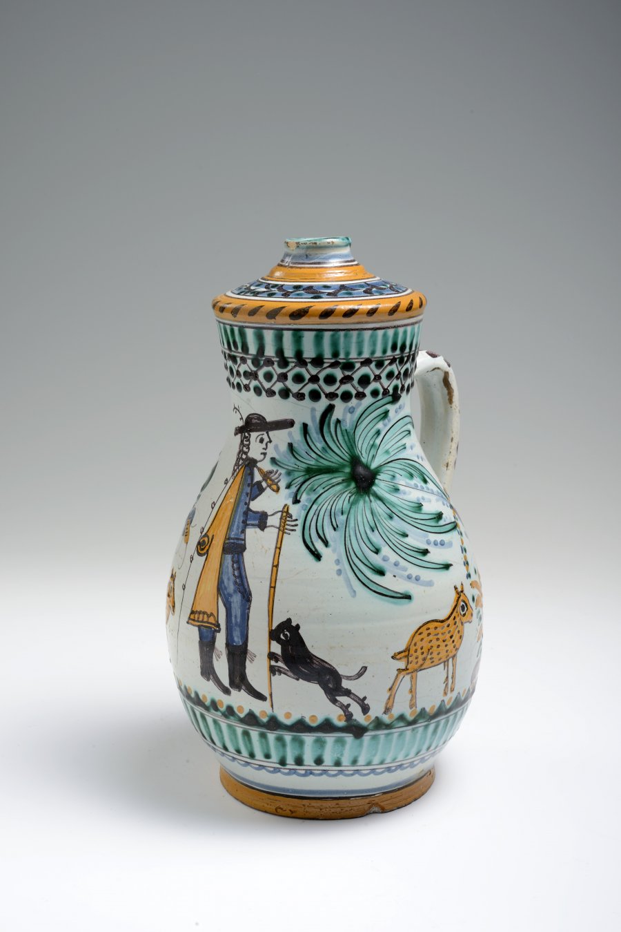 A NARROW MOUTH JUG ("OWL" STYLE)
