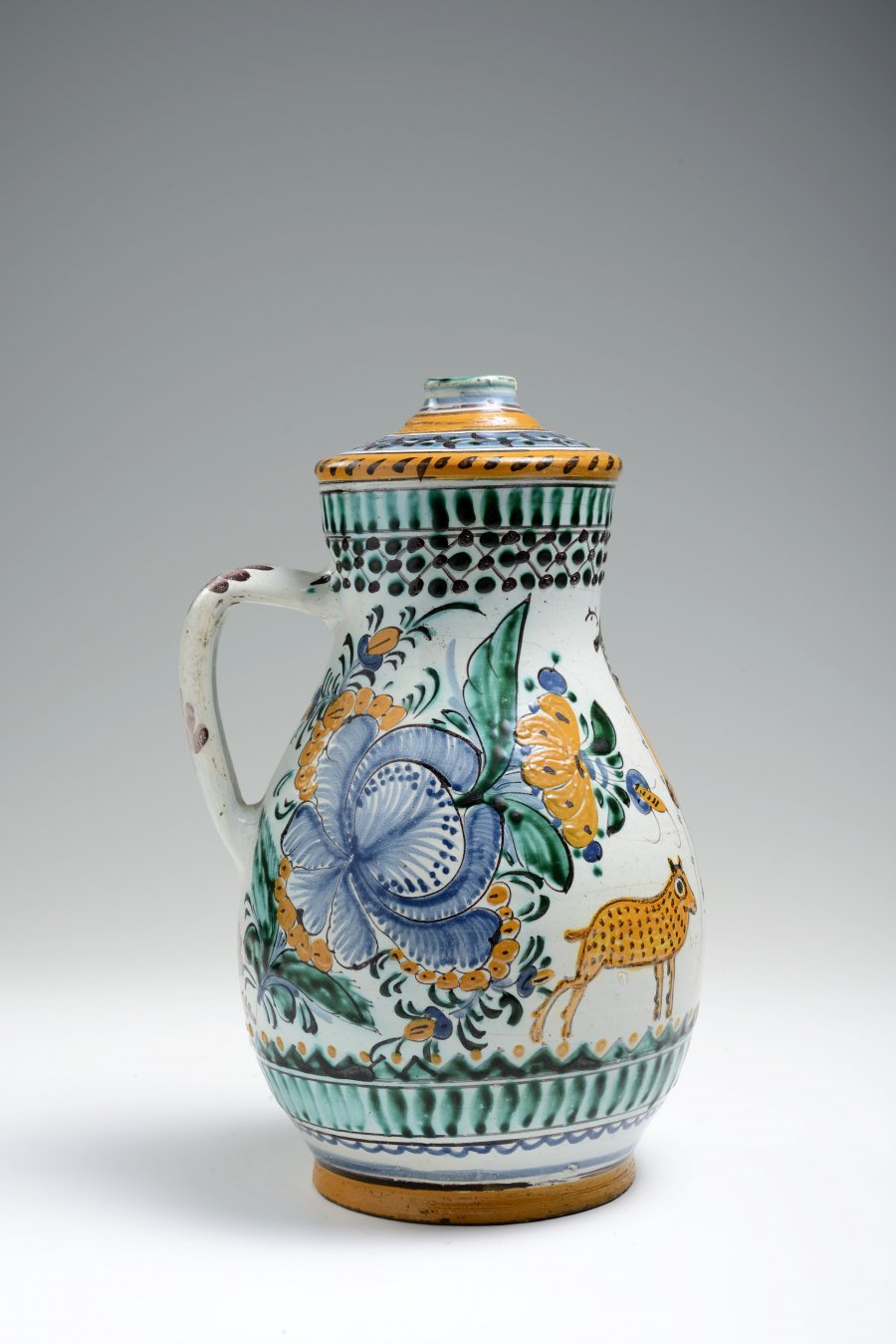 A NARROW MOUTH JUG ("OWL" STYLE)
