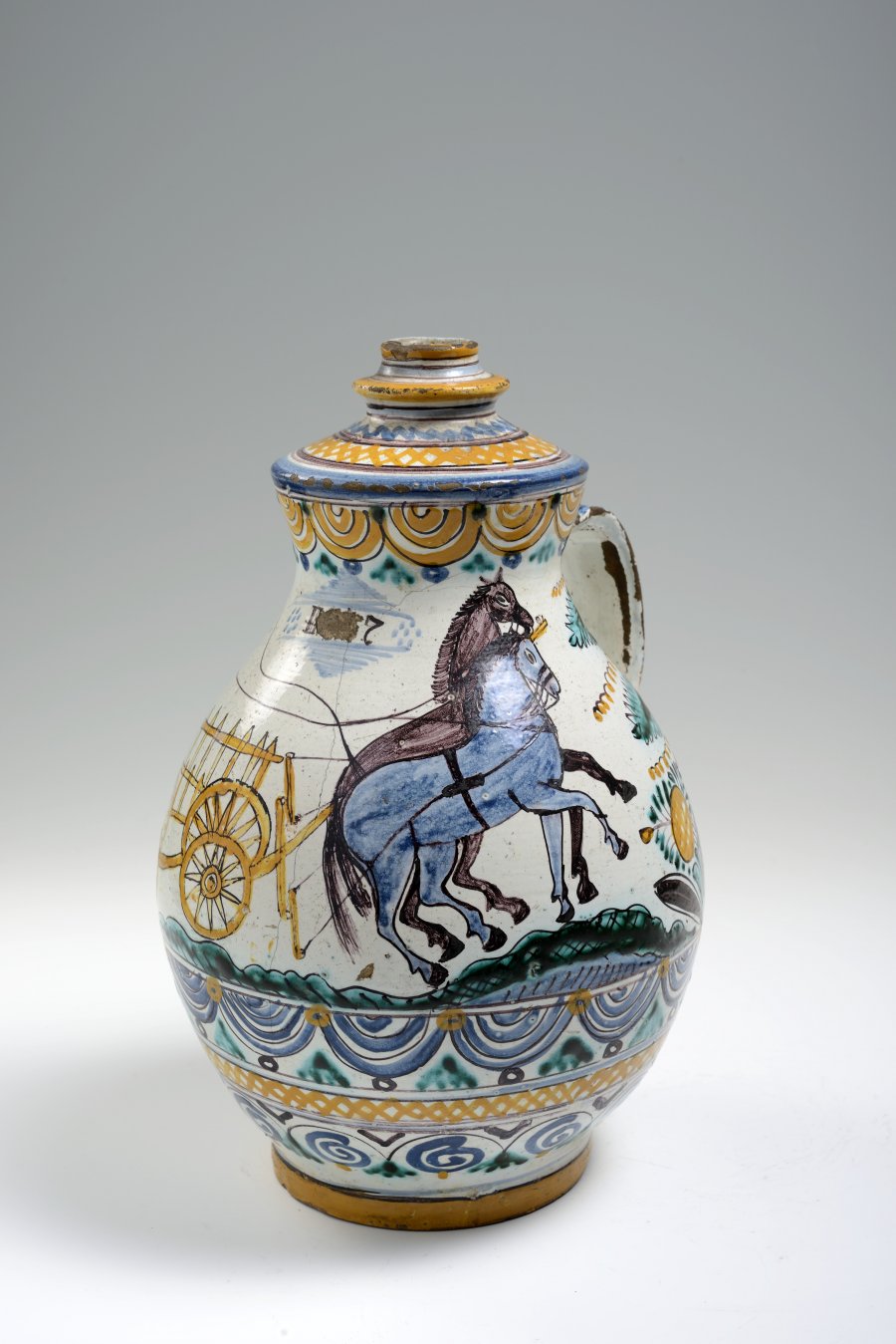 A NARROW MOUTH JUG ("OWL" STYLE)