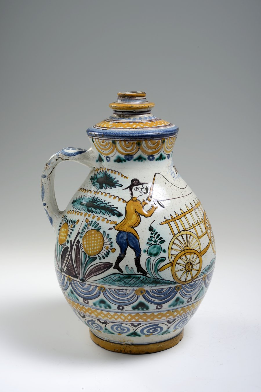 A NARROW MOUTH JUG ("OWL" STYLE)