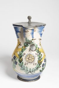 A HABAN JUG WITH LID