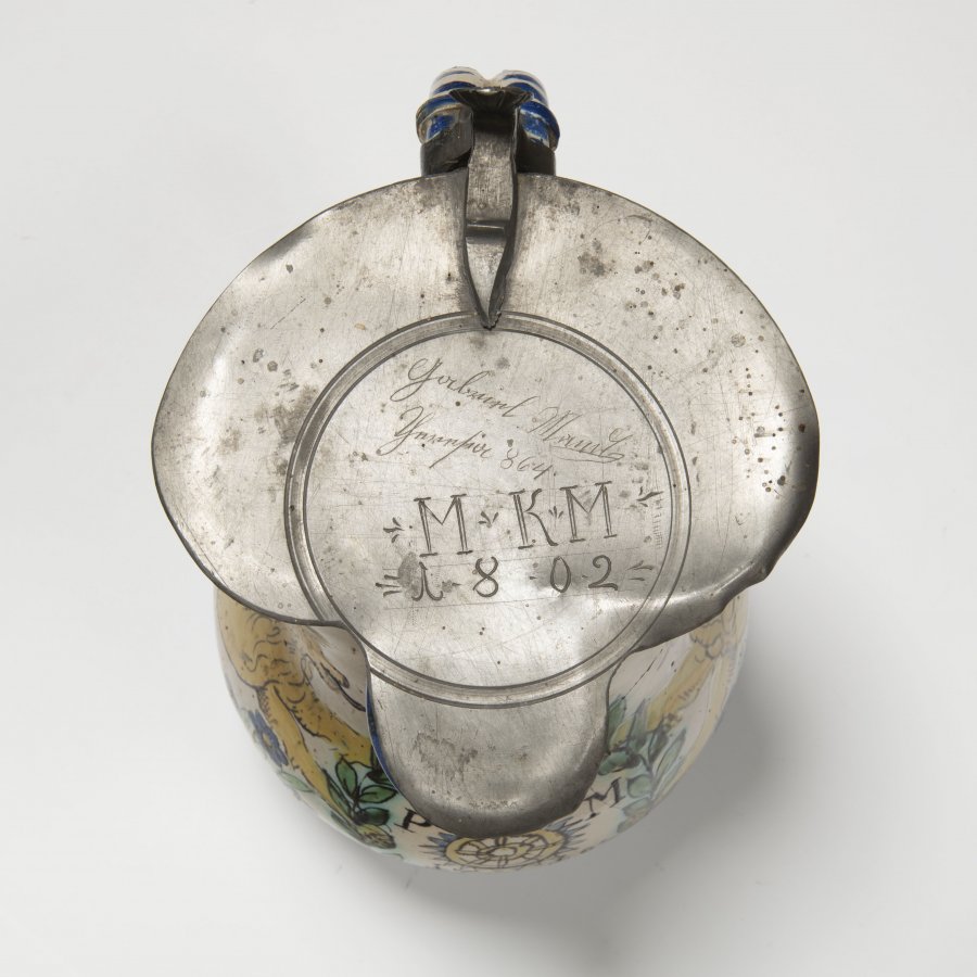 A HABAN JUG WITH LID