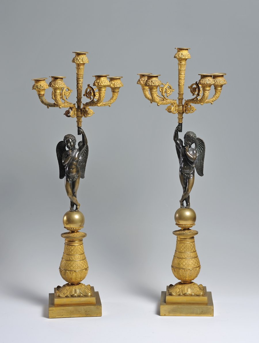 A PAIR OF EMPIRE CANDLE HOLDERS