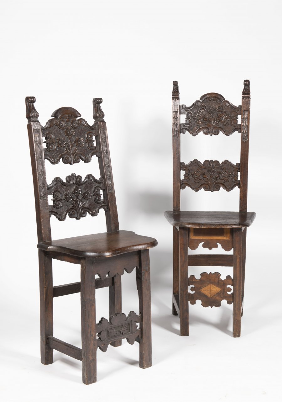 A PAIR OF MANYRISTIC CHAIRS