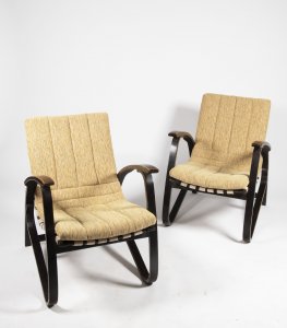 A PAIR OF ARMCHAIRS
