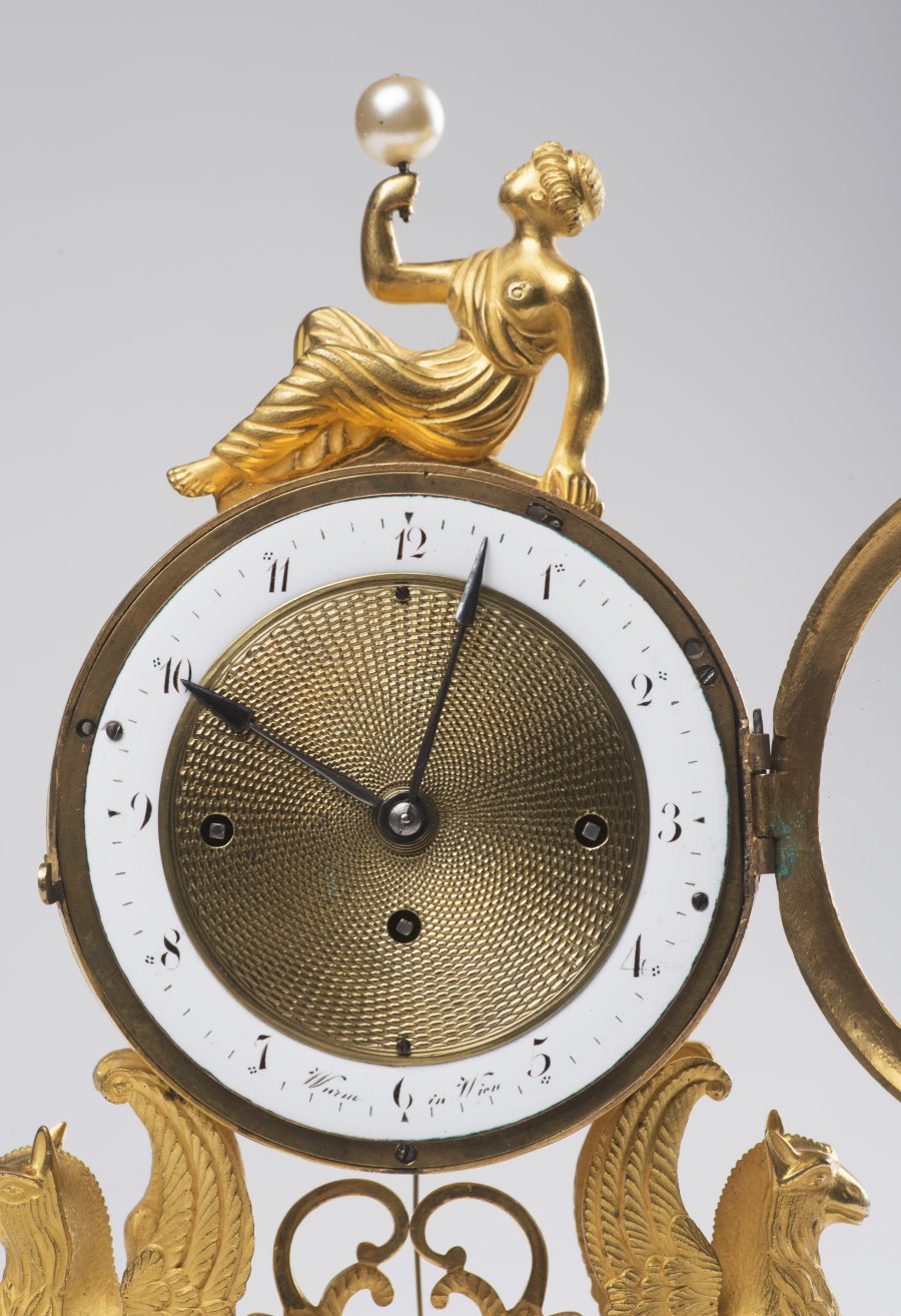 A VIENNESE EMPIRE TABLE CLOCK - CARL WURM