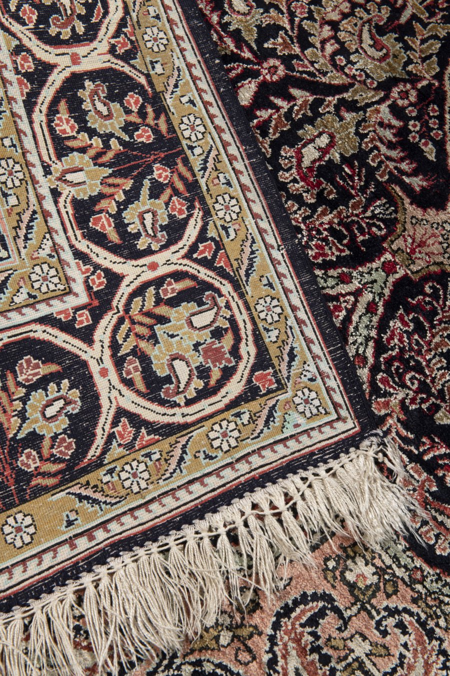 A QOM CARPET